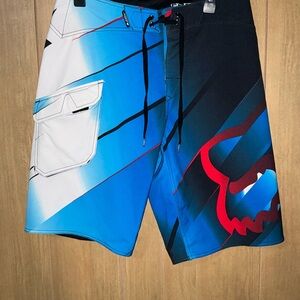 Fox Men’s Blue Gradient Board Shorts with Red Fox Logo